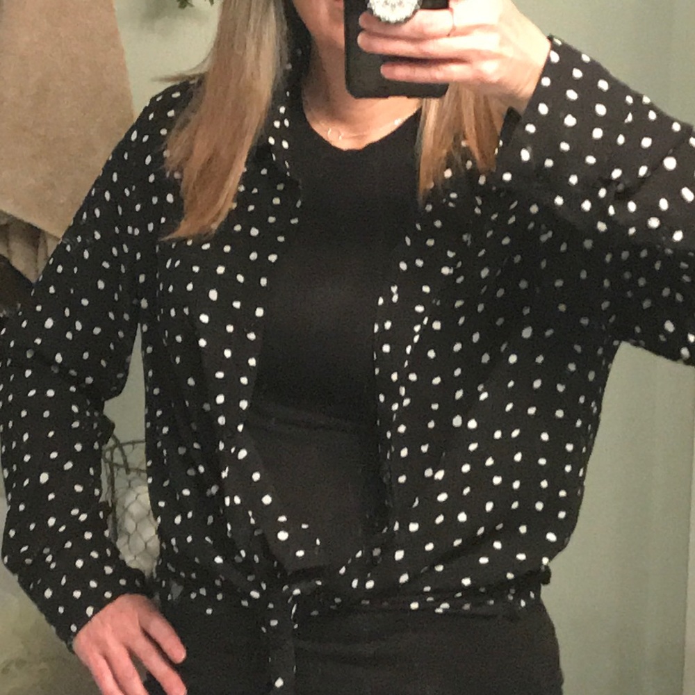 Black polka-dot blouse